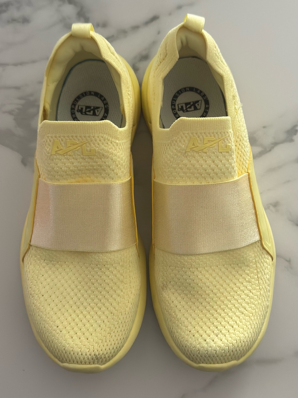 Womens APL (Athletic Propulsion Techloom Bliss slip-on sneakers in yellow